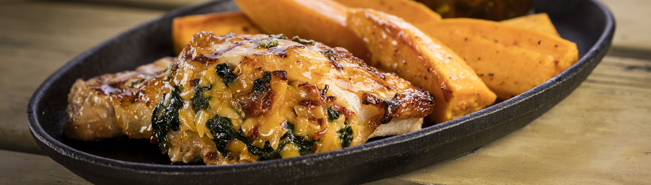 Spinach Stuffed Pork Chop with Sweet Potato Wedges - Love of Food