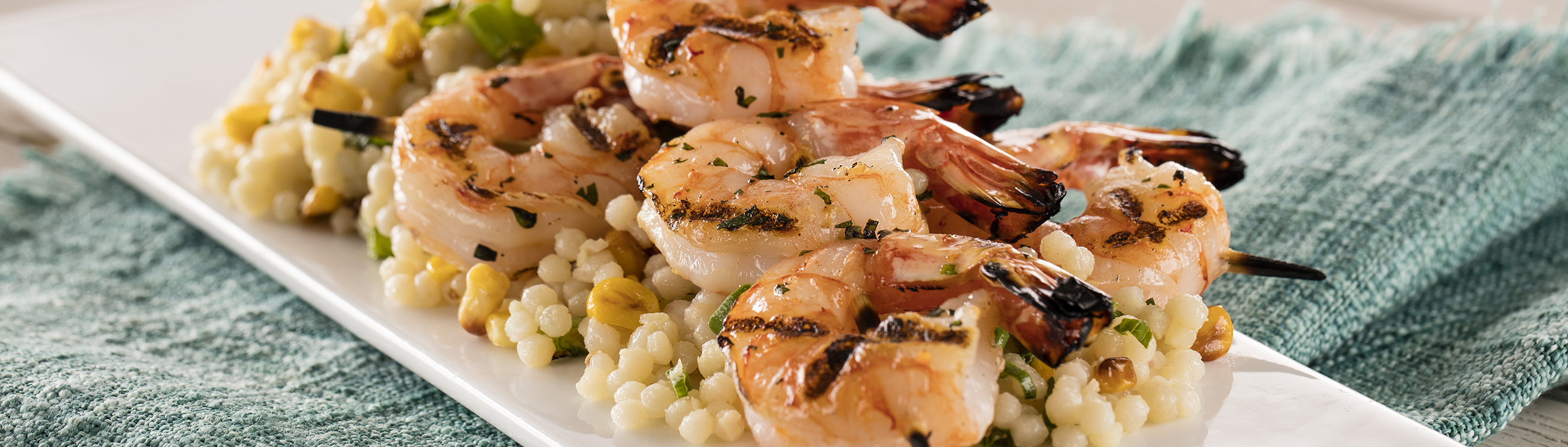 Grilled Marinated Shrimp with Corn and Couscous with Pickled Shallots