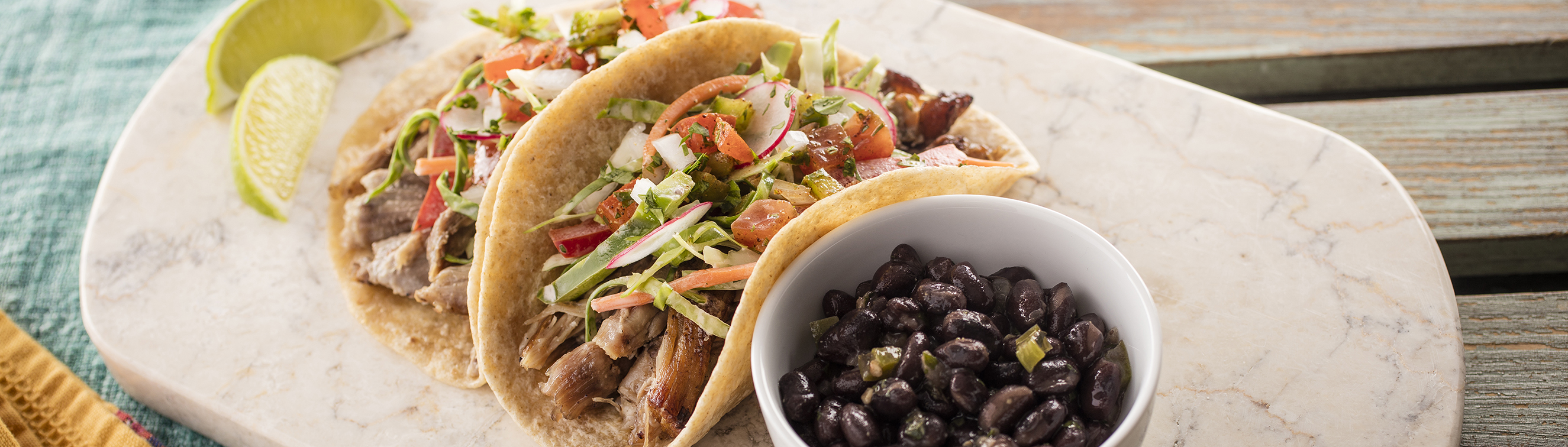 Braised Pork Tacos with Chipotle Coleslaw and Black Beans - Love of Food