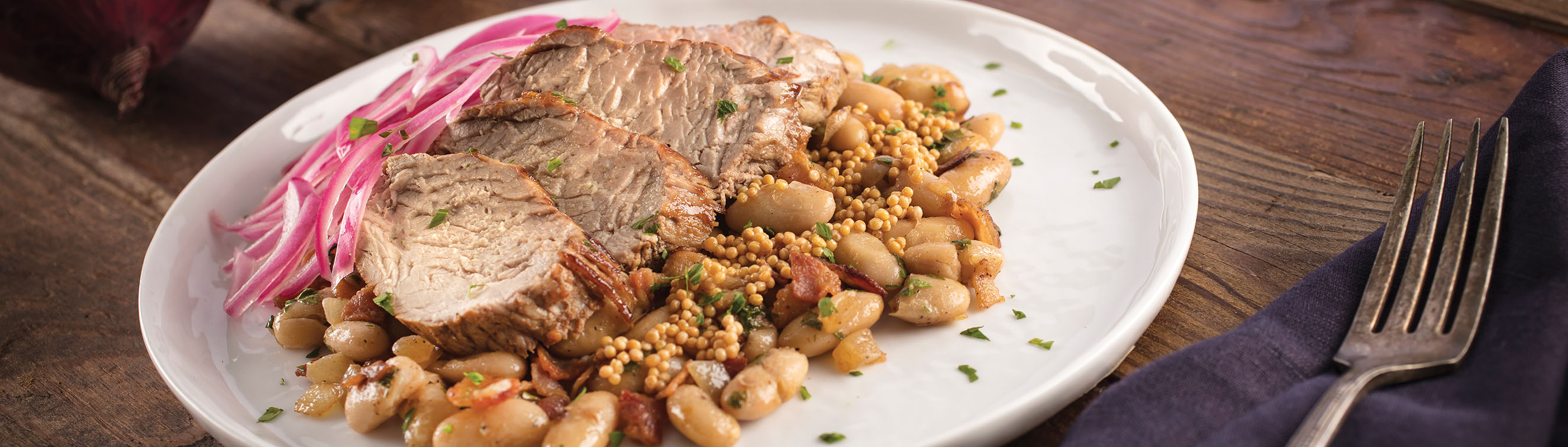 Brined Pork Tenderloin with White Beans, Onions and Bacon - Love of Food